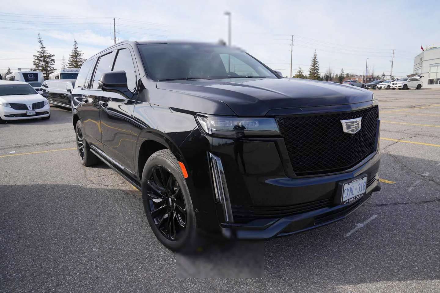 Black Cadillac Escalade stretch limousine serving Pickering Ontario