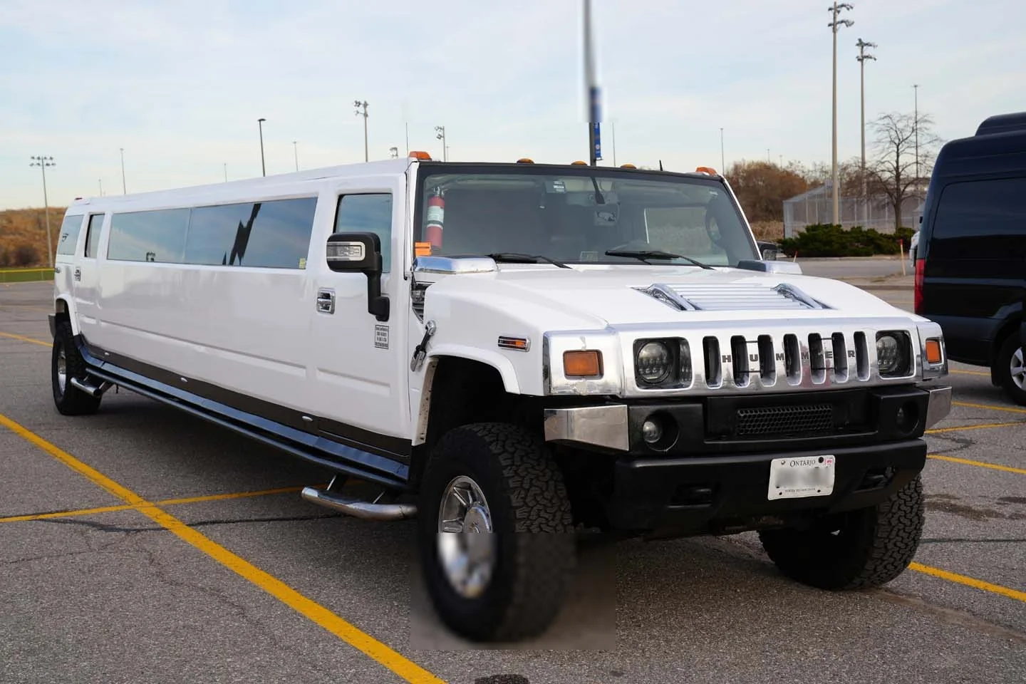 White Hummer stretch limousine serving Oshawa Ontario