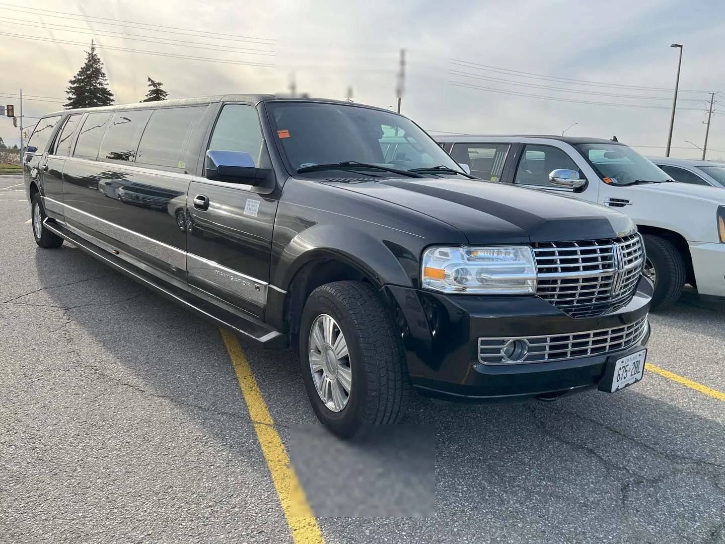 Black stretch Lincoln Navigator limousine serving Toronto